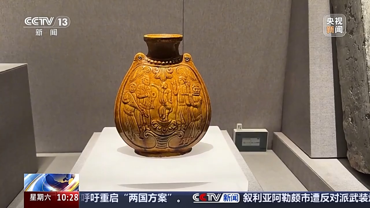 文化中國行丨北齊黃釉扁壺 千年前的“胡騰舞”是啥模樣？